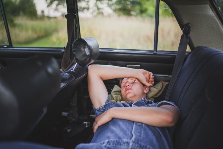 sleeping inside a car