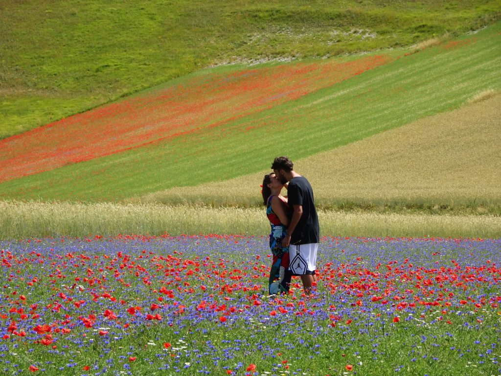 Kissing couple in Norcia, Italy