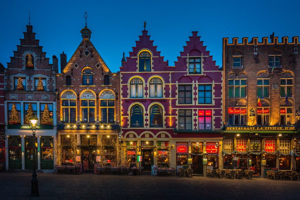 how shops and buildings look at night in Bruges Belgium