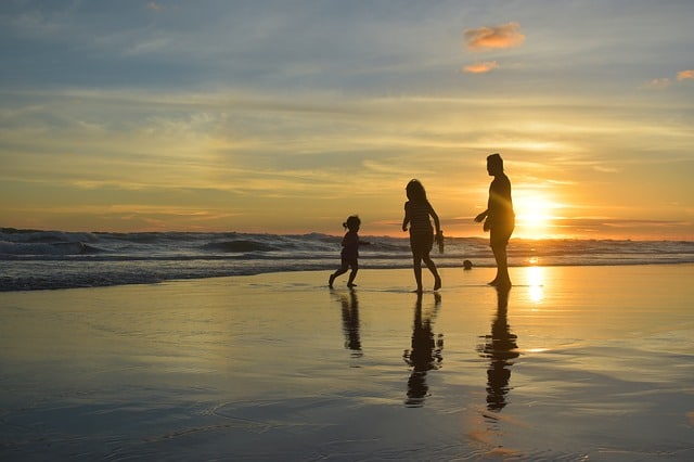 Family during sunset in Ty Nadan, Brittany, France