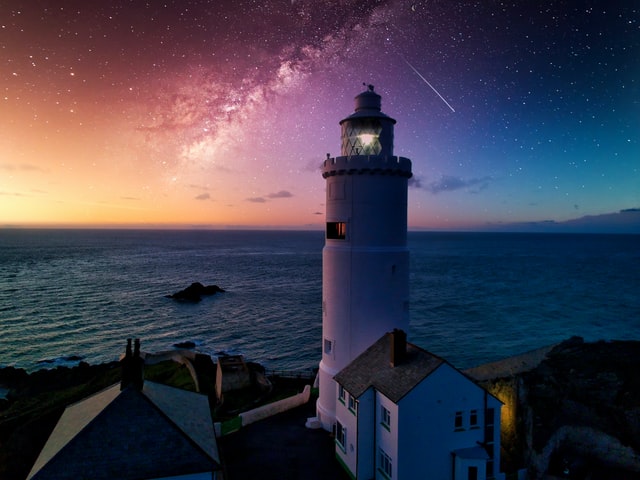 Magical Lighthouse During The Starfall 